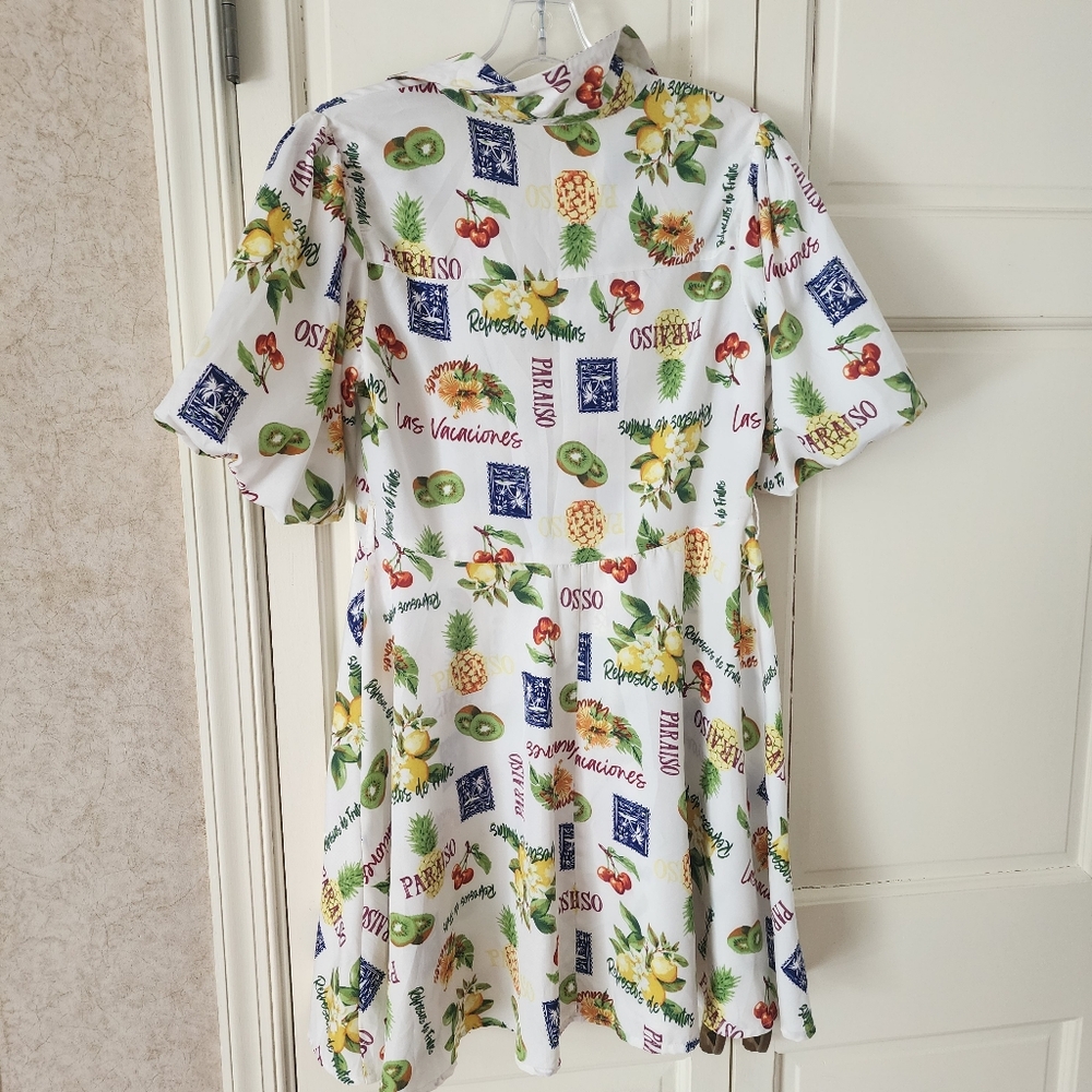 shirt dress with floral and graphic prints. Button-up front.pit To pit 19" - Picture 6 of 8
